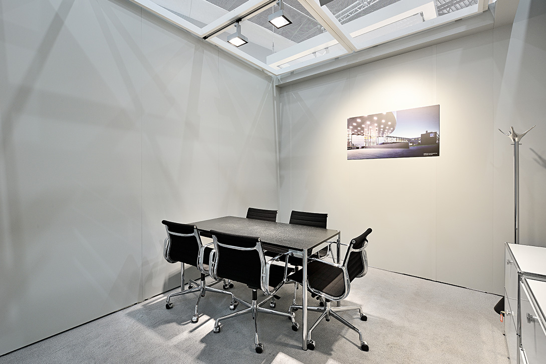 Conference room of a trade fair booth made of Mila-wall wall modules